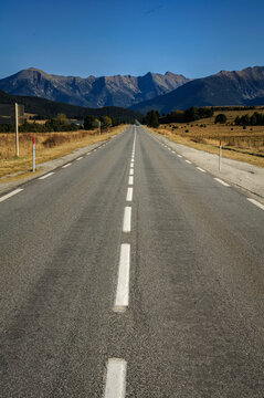 Straight road between La Quillane and Les Angles. In the background, the mountains of the Eastern Pyrenees between Cambredase and Puig de Gallin&agrave;s (Pyr&eacute;n&eacute;es Orientales, France)