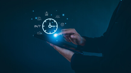  hand holding virtual 24-7 with clock on hand for worldwide nonstop and full-time available contact of service concept. customer service, nonstop service concept.