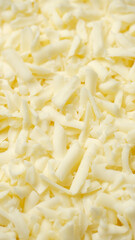 Heap of grated cheese, close up
