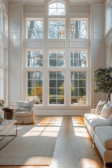 Fototapeta premium Elegant interior design of a modern, white-themed house with comfortable furniture and bright ambiance