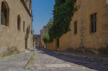 Picturesque scenic narrow alleys with traditional cobblestone streets and Souvenir shops in Old...