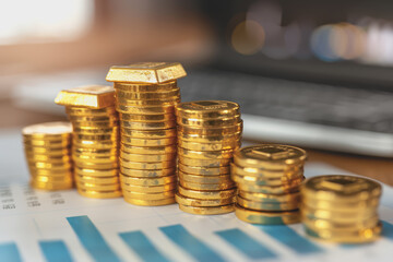 Gold bars stack on rate product life cycle stages with graphical data.