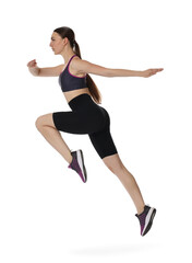 Young woman doing aerobic exercise on white background