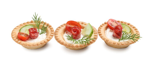 Delicious canapes with dry smoked sausages, cream cheese and vegetables isolated on white