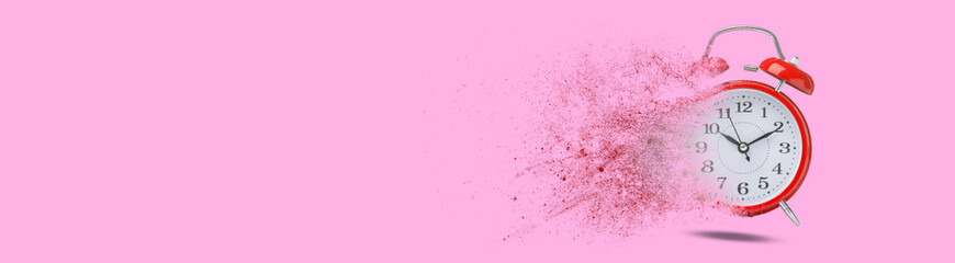 Red alarm clock dissolving on pink background, banner design with space for text. Flow of time