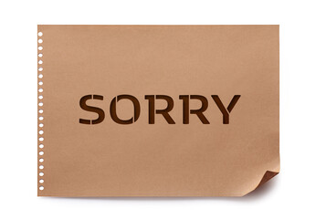 Sorry paper note on white background, top view