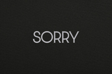 Word Sorry on black background, apology card design