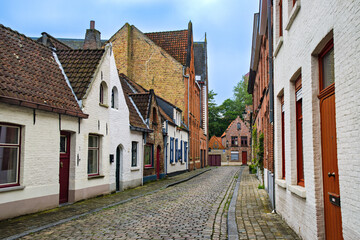 Street with old houses in Bruges, Brugge, in Belgium, Europe