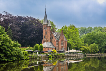 Fototapeta premium Minnewater park, Kasteel Minnewater in Brugge, Bruges, Belgium, Europe