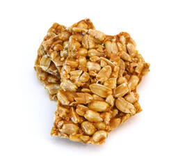 Honey bars with peanuts, sesame and sunflower seeds isolated