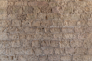 abstract background of an old stone wall close up