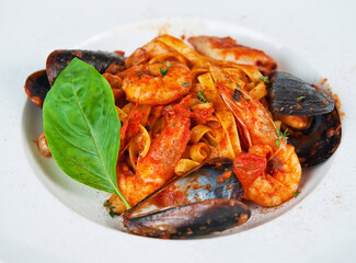 Seafood pasta delight on white plate