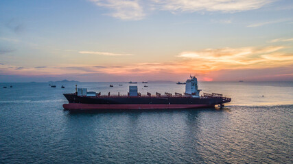 Aerial view cargo ship, Logistics and transportation of International Container Cargo ship in the open sea, Top view of cargo ship.