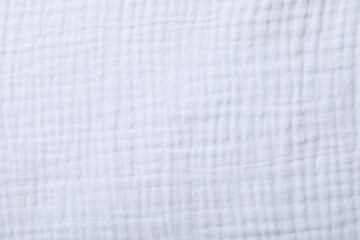 Texture of white fabric as background, top view