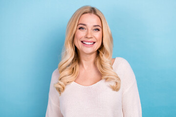 Photo of positive lovely nice woman wear trendy white clothes isolated on blue color background