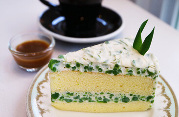 Lod Chong Chiffon Cake, a Pandan Flavored Rice Flour in Sweetened Coconut Cream Served with Palm Sugar Caramel Syrup