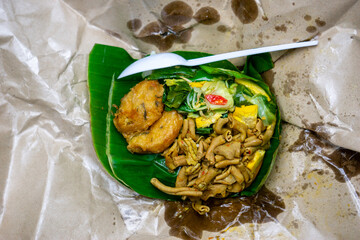 Nasi bungkus. Nasi bungkus is one of indonesian traditional food with various side dishes