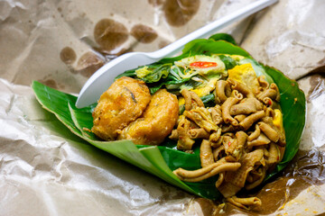 Nasi bungkus. Nasi bungkus is one of indonesian traditional food with various side dishes