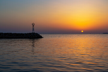 Fototapeta premium Scenic sunset at Nikiti Marina, Sithonia, Chalkidiki peninsula, Central Macedonia, Northern Greece, Aegean Sea coast