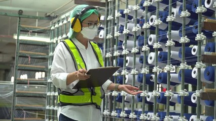 Professional engineer women, worker, mechanical, maintenance, engineering women training. Engineer woman worker work design program machine in Textile factory. industry.
