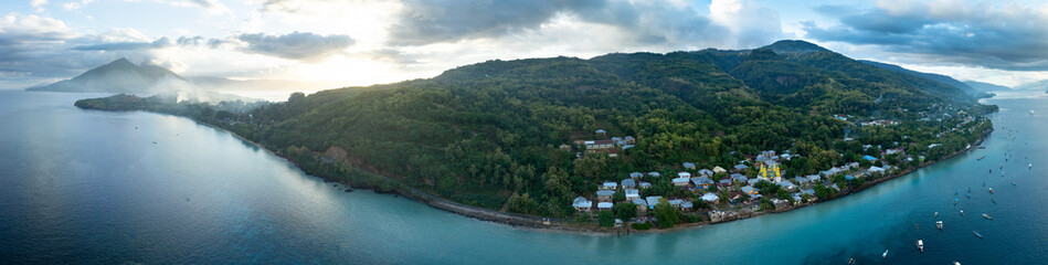 The scenic, tropical island of Alor is fringed by coral reef and black sand slopes in eastern Indonesia. This area is part of the Coral Triangle and is home to spectacularly diverse coral reefs.