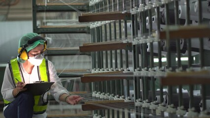 Professional engineer women, worker, mechanical, maintenance, engineering women training. Engineer woman worker work design program machine in Textile factory. industry.
