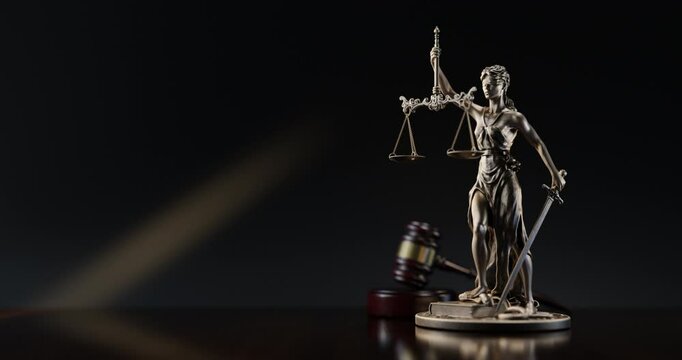 Legal Concept: Themis is the goddess of justice and the judge's gavel hammer as a symbol of law and order on the background of books