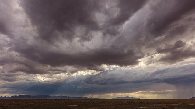 Timelapse of dark stormy clouds moving over the Utah desert near Simpson Springs.