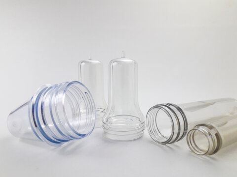 PET preform isolated on a white background, is plastic that is the result of injection before the blow molding process in making PET bottles