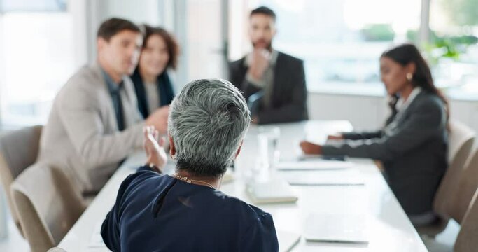 Back, person and discussion with group in boardroom, planning and training for development of business. Hand, ceo and boss in teamwork, leadership and instructing of interns on project and trader