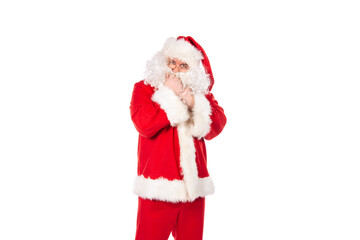 Displeased Santa Claus posing in the studio on a white background.