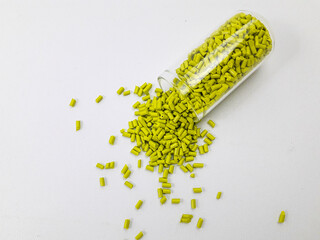 margarita green masterbatch granules on white background,color pigment carrier polymer in plastic...