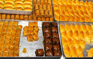 Azerbaijani, Turkish, oriental various sweets and baklava on iron trays.