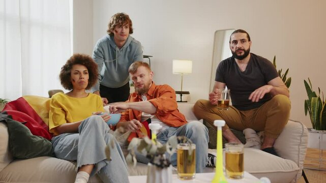 German fans watching football match on tv and drinking beer, cheering for Germany team. European and World football cup 2026 USA, Canada, Mexico. Paris Games, Sports and soccer fans. Slow Motion
