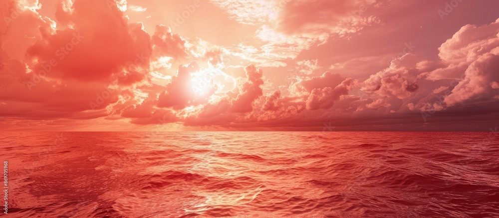 Poster Red clouds above the ocean with a horizontal orientation suitable for various text designs within the copy space image.