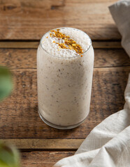Delicious smoothie on a rustic table. Healthy drink.