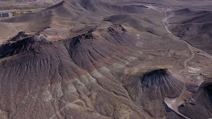 Geological Waves: The Desert’s Undulating Surface,  Like waves frozen in time, this image...