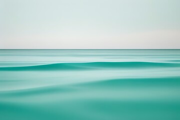 Fototapeta premium Minimalist abstract with ocean breeze gradient in seafoam green, aqua, teal, turquoise, navy blue, sky blue, light gray, white, sandy beige, and coral pink