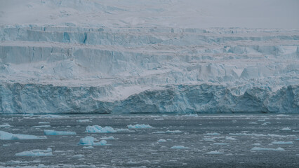 Serene Nature Scene Frozen Antarctica. Landscape of Ice and Snow Admiralty Bay. Beautiful Icebergs Floating. Wallpaper Background