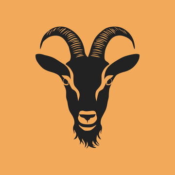 recommend clip art: Black silhouette of a goat head with big horns facing forward on an orange background