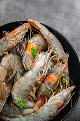 shrimp raw seafood prawns natural food fresh appetizer meal food snack on the table copy space food background rustic keto or paleo diet Pescetarian
