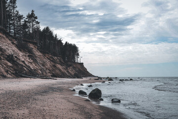 Scandinavian style Baltic sea seaside shore view with small rocks.