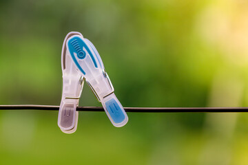 clothes pegs nestled together © TomaszGwóźdźFoto