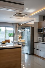 Modern Sleek Kitchen Design with Air Conditioner, Island, and Contemporary Appliances for Comfortable Cooking Environment