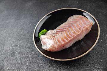 raw fish fillet seafood ready to cook natural fresh appetizer meal food snack on the table copy space food background rustic top view keto or paleo diet vegetarian  food Pescetarian