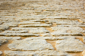 Antique dry stone masonry. Ancient,antique brick wall. Stone wall.