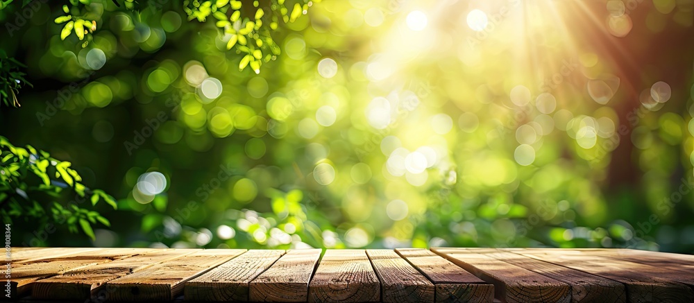 Poster wooden deck table with a blurred green background, ideal for showcasing products in a copy space ima
