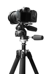 Modern camera with tripod isolated on white. Photographer's equipment