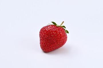 whole ripe strawberry on white background