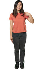 Full-body young Chinese woman person pointing by hand to a shirt copy space, proud and confident